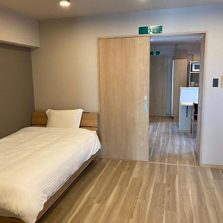 ホテルトーマスとまり Naha Esterno foto