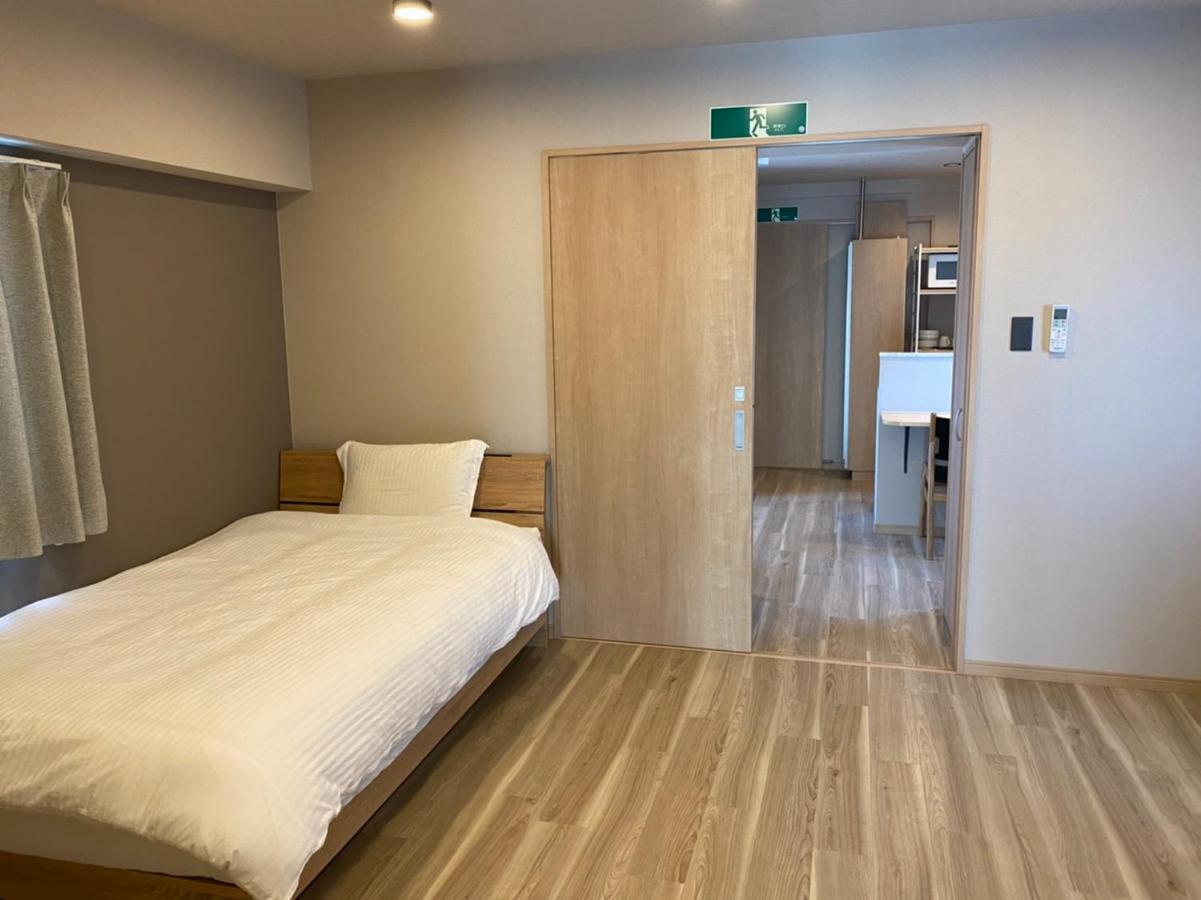 ホテルトーマスとまり Naha Esterno foto
