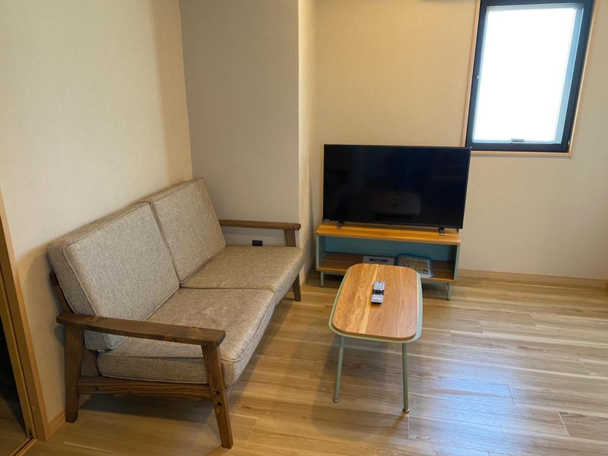 ホテルトーマスとまり Naha Esterno foto