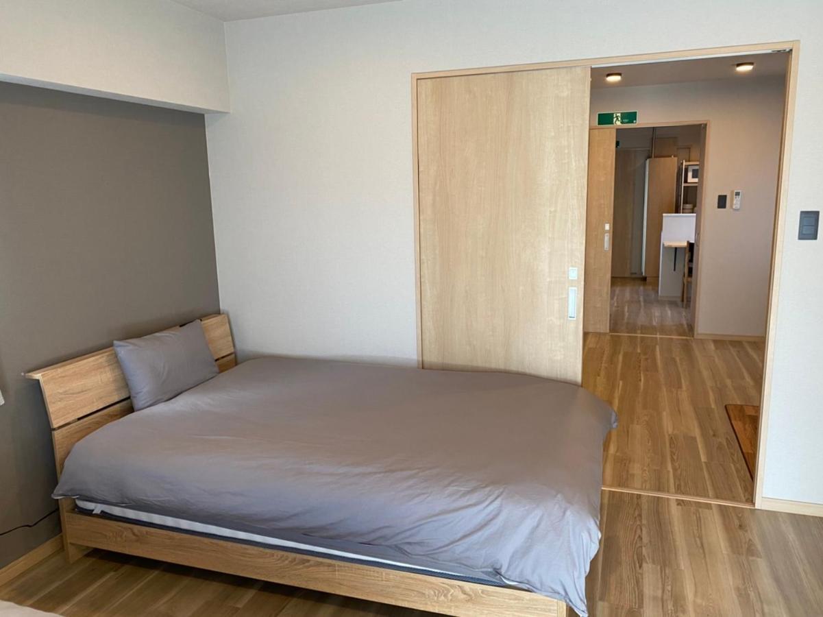 ホテルトーマスとまり Naha Esterno foto