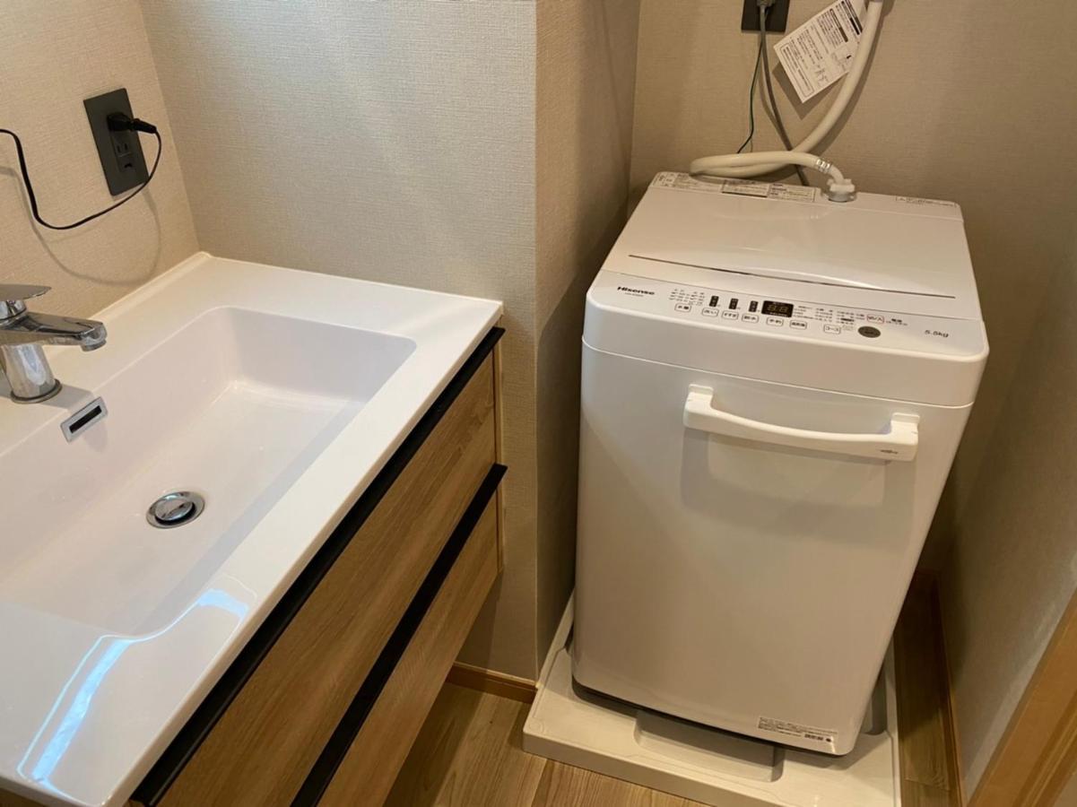 ホテルトーマスとまり Naha Esterno foto
