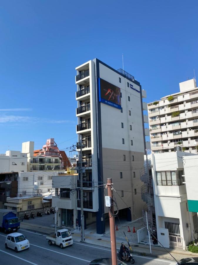 ホテルトーマスとまり Naha Esterno foto