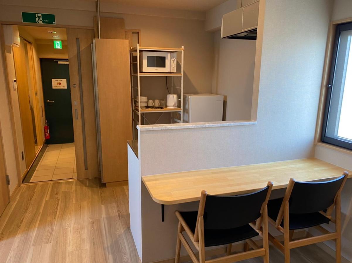 ホテルトーマスとまり Naha Esterno foto